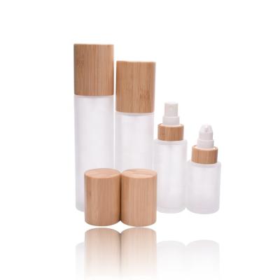 China Package 30ml 50ml 80ml 100ml 120ml Luxury Bamboo Lotion Cream Bottle Cosmetic Frosted Glass Bottle Clear Bamboo Lid for sale