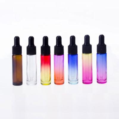 China Perfume 2021 Luxury Perfume Cosmetic Packaging Colored 10ml Empty Slim Glass Dropper Bottle for sale