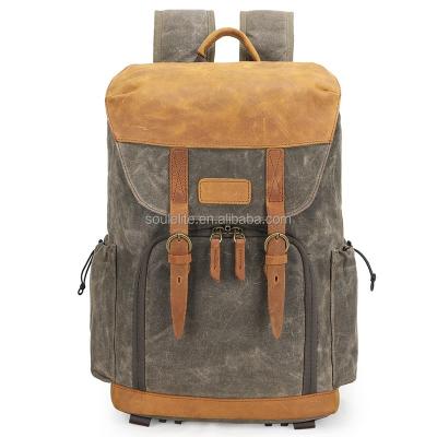 China fashionable & Rugged camera cool design capacity great ride quality waterproof canvas backpack with security cover open and inside pockets for sale