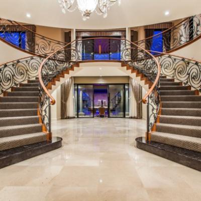 China Powder Coat Wrought Iron Indoor Fancy Curved Staircase New Modern Australia Design for sale