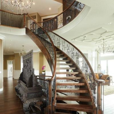 China Contemporary Wrought Iron Railing Design Curved Staircase for sale