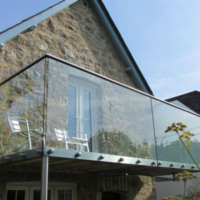 China Modern 12 mm thick tempered clear standoff balustrade for balcony/stair/304/316SUS glass standoff railing system for sale