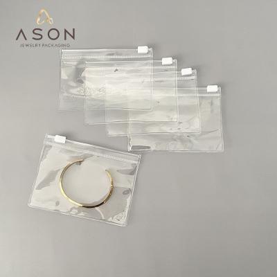 China PVC Customized Transparent PVC Jewelry Zipper Bag Earring Jewelry Storage Packaging Bag for sale