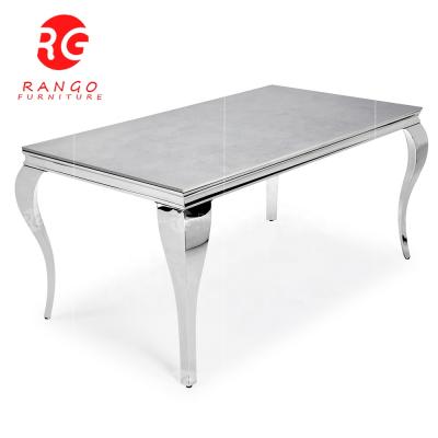 China (size) high quality adjustable stainless steel artificial marble top dining table with 6 chairs for sale