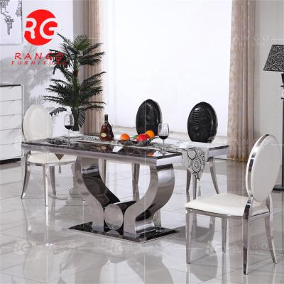 China (Size) Adjustable Stainless Steel Gold White Marble Top Dining Table With 6 Chairs for sale