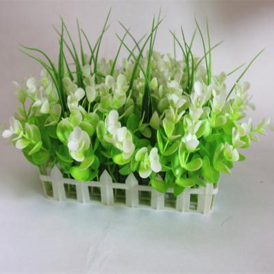 China Wedding Small Decor Eucalyptus Grass Lawn Flower Fence Plastic Artificial Green Plant Garden Decor for sale