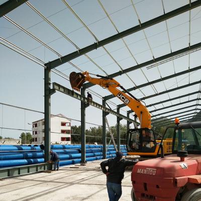 China Industrial professional steel frame crane prefab warehouse building for sale for sale