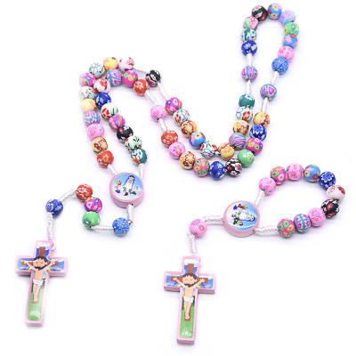 China Child Religious Rosary Colorful Polymer Clay Beads Holy Cross Necklace and Bracelet Baptism Beads Catholic Gift Set for sale