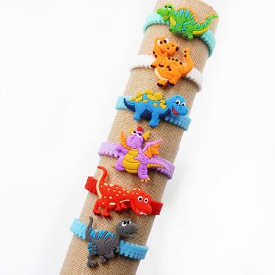 China Wristband Silicone Dinosaur Wristband Kids Animal Birthday Party Favors Dinosaur Gifts Supplies for sale