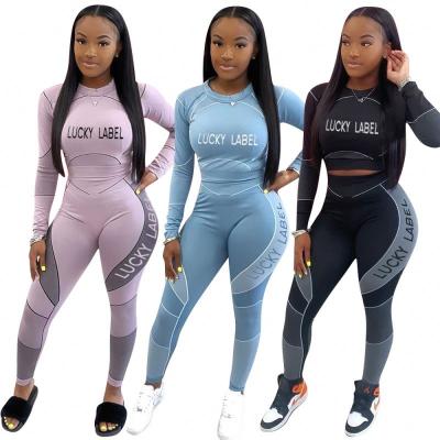 China Customized new QUICK DRY ladies yoga wear new two-piece positioning letter printing casual long-sleeved sports suit for sale