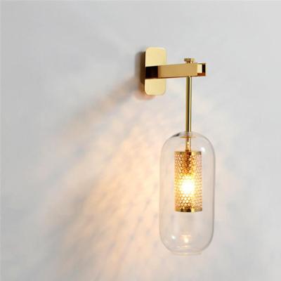 China Modern Minimalist Clear Glass Wall Lamp For Bedroom Living Room Hotel Home Decorative Luxury LED Wall Light Gold for sale