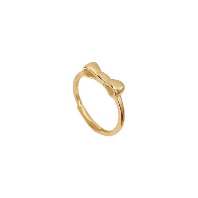 China Stainless Steel Smooth Surface Minimalist Ring Bow Knot Rings With Jewelry 18k Gold Plated for sale