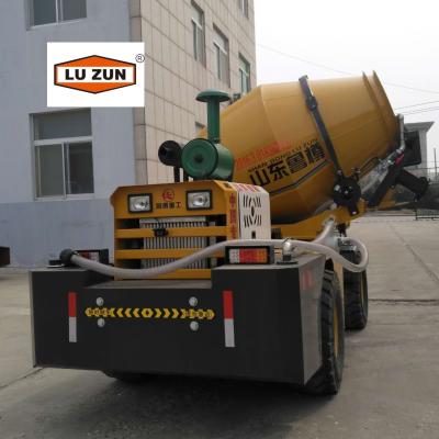 China Hotels LUZUN Mobile 1.2 Cubic Meter Concrete Mixer Machine With Automatic Arm for sale