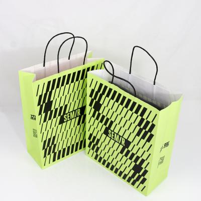 China Recycled Materials Latset Design Kraft Paper Shopping Courier Bag Silver Hot Stamping Printed Paper Bags With Handles for sale