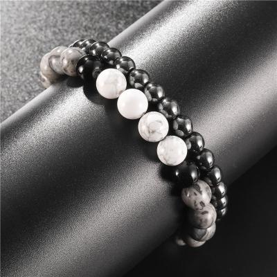 China Hot sale 2pcs/set 6mm8mm iron punk black stone frosted matte white pine stone stretch bead bracelet for men for sale