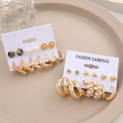 China New Trendy minimalist creative geometric set of Pearl12 metal pair fashion jewelry earings for sale