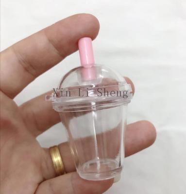 China Diy Cup Keychains DIY Snow Globe Cup Key Chain Plastic Empty Epoxy Resin Cup Keychains With Flat Lid for sale