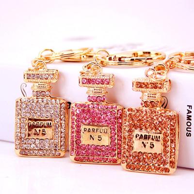 China Wholesale New Perfume Brand Key Chain Bottle Friut Key Chain Fashion Pendant Creative Automatic Key Chain Keychain for sale