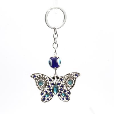 China Turkish Hot Selling Ebay Butterfly Eye Evil Eyes Evil Eyes Dangling Key Chain Key Chain for sale