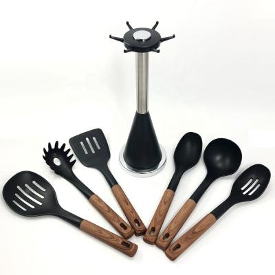 Cina 2024 Best seller Manico in legno Silicone utensili da cucina Set con materiale Nylon66 in vendita