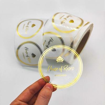 China Customized Waterproof Transparent Circle Waterproof Logo Label Roll Personalized Gold Foil Logo Clear Sticker for sale