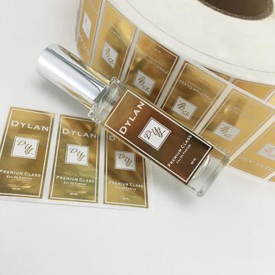 China Waterproof Custom Adhesive Cosmetic Perfume Sticker Gold Foil Glass Bottle Logo Label for sale