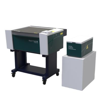 China RAYTHER 7045 75W 90W Mini Nonmetal CO2 Laser Cutting Engraving Machine for sale