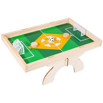 China 2022 New Material Chess Set Chess Pieces Wooden Table Top Kids Adult Eco-Friendly Table Football Game Bounce Wooden Catapult Chess for sale