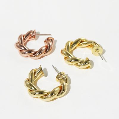 China New ArrivalTRENDY Gold Plated Twisted C Ear Studs Charming Spiral Stud Earrings Female for sale