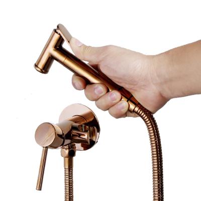 China Rose Gold Hot And Cold Shower Faucet Mixer Bathroom Shower Kit Easy Installation Handheld Bidet Sprayer Toilet Solid Brass for sale