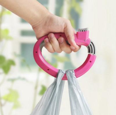 China Viable Plastic Portable Handle Bags Holder Grocery Carrier Grocery Shopping Bag Handle Carrier Lock Foldable Kitchen Tool for sale