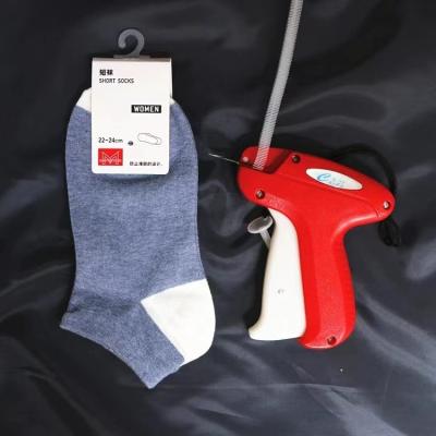 China New Design Durable Labeling Machine ABS Labeling Gun Red And Green Material For Socks Clothes for sale