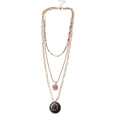 China FASHIONABLE Secret Eye Natural Shell Stone Cluster Element Layer Chain Necklace With Multi Seed Bead Jewelry For Woman for sale