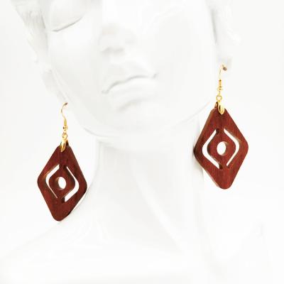 China China Vintage Long Earrings Hollowed Out Wooden Carved Earrings Craft Earrings for sale