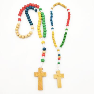 China The Other Colorful Wood Rosary Necklace Jesus Logo Golden Prayer Necklace Cross Bracelet for sale