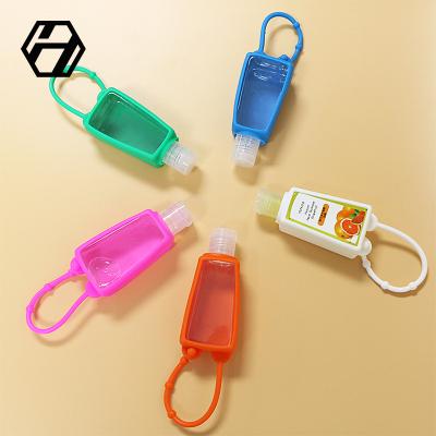 China Silicone Personal Holder Sanitizer Hand Packaging Skin Care Key Chain And Flip Cap Lid Pocket Leakproof Bottle for sale