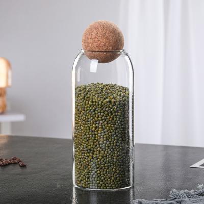 China Freshness Preservation Factory Price Candle Jar Borosilicate Clear Glass Storage Jar With Cork Ball Lid for sale