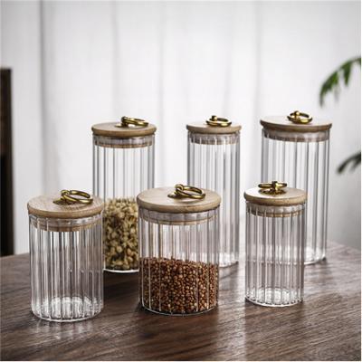 China Hot Selling Freshness Preservation Stripe Seal Kitchen Storage Glass Bottle Jar With Bamboo Lid for sale