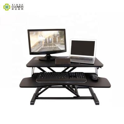 China Pneumatic Adjustable Riser Foldable (Height) Standing Desk / Portable Laptop Desk Sit Stand Workstation Desk for sale