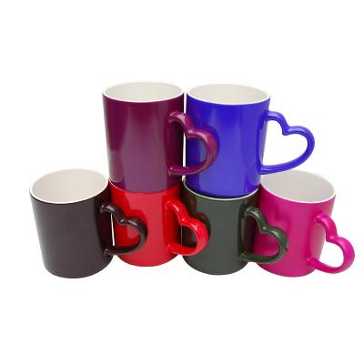 China Viable Good Quality Color Changing Magic Heart Handle Ceramic Cup Mug for sale