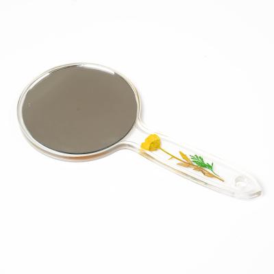 China Custom Transparent Color With Dried Flowers Handle Plastic Mirror for sale