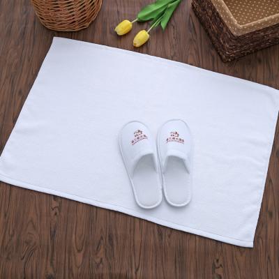 China Sustainable Embroidery Logo 100%Cotton Super Absorbent Thin Hotel Floor Mat Towel for sale