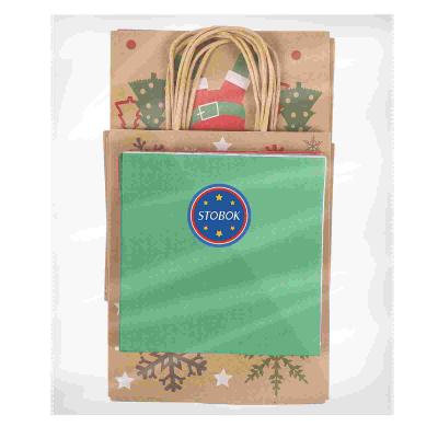 China Buying Recycled Paper Tote Bag Elk Christmas Tree Materials Christmas Kraft Paper Bags Materials Cardboard Top Custom Merry Christmas Gift Ba for sale