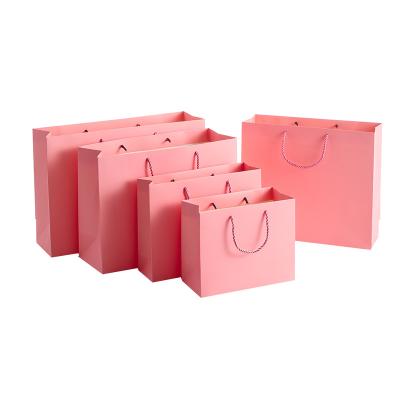 China Free Sample Recyclable Big Pink Biodegradable Paper Bags Custom Paper Bags for sale