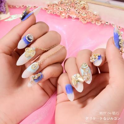 China Finger Decoration Alloy Zircon Nail Art Designs Nail Accessories Butterfly Metal Chain Nail Dangle Decorative Charms for sale