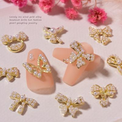 China Bow Tie Japanese Nail Finger Decoration Alloy Nail Jewelry Pearl Jewelry Designer Nail Dangle Decorations for sale