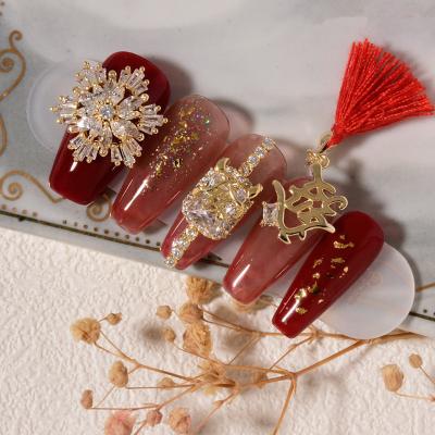 China Wholesale Chinese Red Traditional Rich Zircon SnowFake Zircon New Year Words Tassels Nail Charms For 3D Nail Supplies for sale