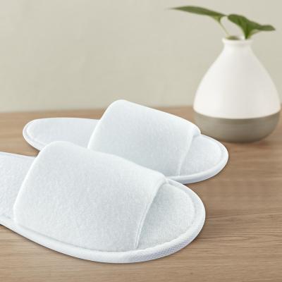 China Exquisite Cheap Hotel Disposable Amenities and Good Quality Simplicity Customizable Logo Open Toe White Biodegradable Hotel Disposable Slipper for sale