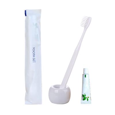 China Single toothbrush and toothpaste set independent package hotel travel use toothpaste and toothbrush set for sale