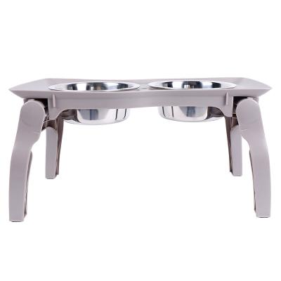 China Sustainable Pet Feeder Bowl Stand Raised Dog Food Bowls Stainless Steel Bowl With Foldable Table for sale